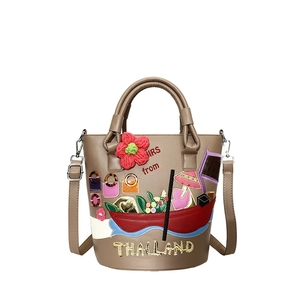 Retro khaki bucket bag with Thailand embroidery and 3D floral patches for women