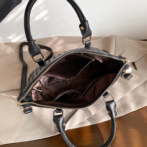 Sac à main tissé noir en cuir avec grande capacité intérieure et design haut de gamme