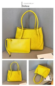 Detail of woven texture on yellow tote bag and matching clutch set for women