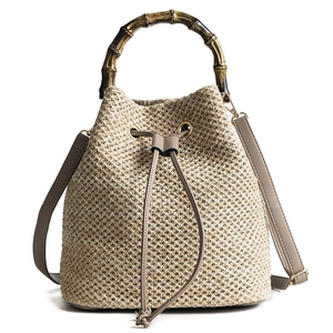 Retro large capacity woven bucket bag with natural bamboo handles and adjustable strap