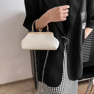 Elegant white pleated evening bag with gold metal handle and chain strap for women