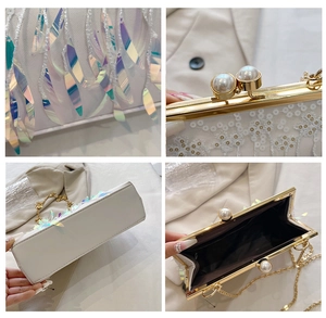 Detail of white evening bag with iridescent sequins, lace, and double pearl clasp