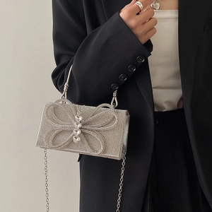 Elegant silver rhinestone evening clutch bag with butterfly crystal decoration and chain strap