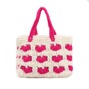 Borsa tote all'uncinetto fatta a mano in crema e rosso rosa con manici intrecciati