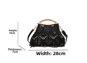 Detail of evening clutch bag showing 28cm width 19cm height and 7cm thickness dimensions