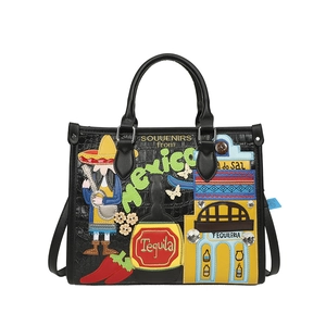 Sac à main noir motif crocodile avec broderies et graphismes vibrants de style mexicain