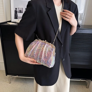 Iridescent sequin crossbody evening bag with gold chain strap and metal kiss lock