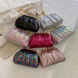 Sparkly sequin evening clutches in multiple colors with rhinestone clasp and chain straps