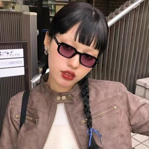 Retro rectangle sunglasses with thick black frames and light purple tinted lenses for street style