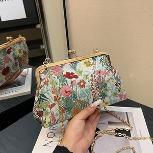 Vintage floral jacquard evening bag with golden chain strap and retro metal clasp