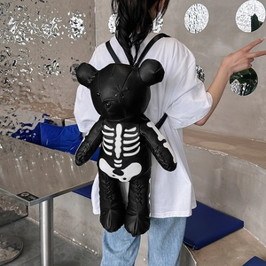Gothic black bear backpack with white skeleton print and stitched leather details