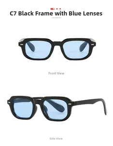 Detail view of rectangular sunglasses with thick black frames and light blue tinted lenses