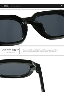 Detail view of integrated nose pads and metal hinge on square black sunglasses