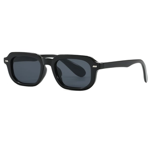 Fashionable square black sunglasses with silver studs and dark grey protective lenses