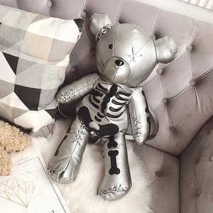 Silver metallic teddy bear skeleton backpack with adjustable straps for women