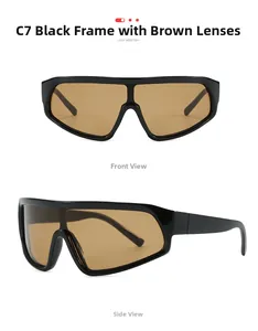 Detail view of oversized sporty sunglasses with black frame and brown tinted lenses