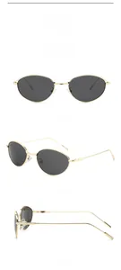 Détails de lunettes de soleil œil-de-chat ovales avec monture dorée et verres gris