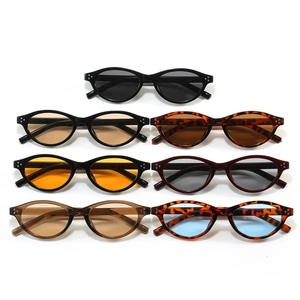 Retro small oval sunglasses collection in assorted colors with chic metallic studs