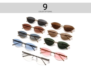 Détails de neuf lunettes de soleil œil de chat sans monture aux branches métalliques