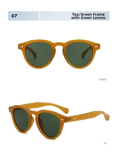 Detailed views of vintage amber round sunglasses with green lenses and C7 model mark