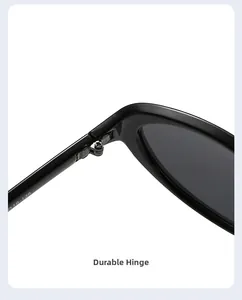 Macro view of sturdy metal hinges and specification text on black cat eye sunglasses