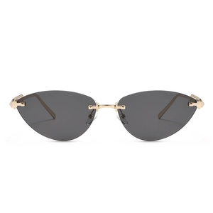 Lunettes de soleil œil de chat sans monture avec verres gris et branches en métal doré
