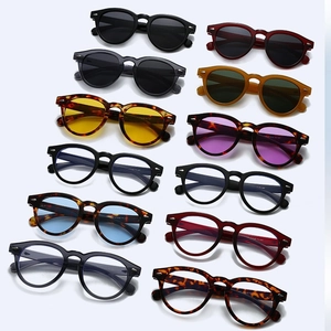 Collection of vintage round sunglasses and blue light glasses with diamond rivets