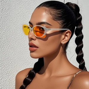 Chic cat eye sunglasses with translucent frosted white frames and orange gradient lenses