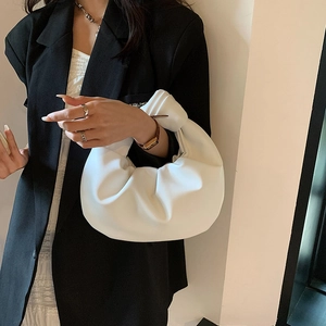 Minimalist white ruched handbag with knotted handle detail for elegant women