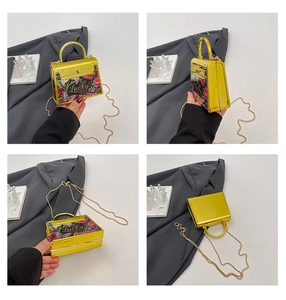 Detailed four-way view of a gold metallic printed mini bag with lucky lettering and chain