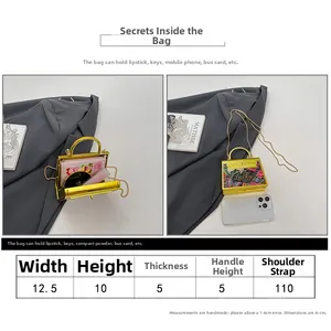 Size guide for mini printed Kelly style handbag showing 12.5cm width and capacity details