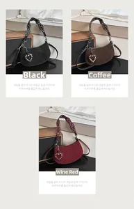 Matte half-moon crossbody bags in black, coffee, and burgundy with rivet heart charms