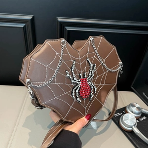 Gothic heart-shaped crossbody bag with spider web embroidery and rhinestone spider detail