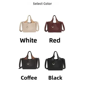 Selection of leather bucket bags in white, red, coffee, and black with metal ring detail