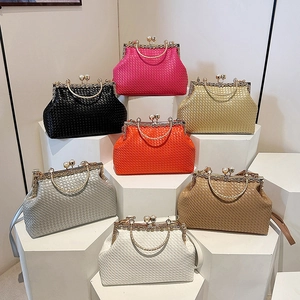 Elegant woven evening clutch bags with pearl clasps and chain straps in seven colors