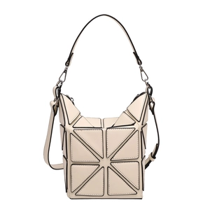 Minimalist geometric patchwork bucket bag in cream white with adjustable shoulder strap