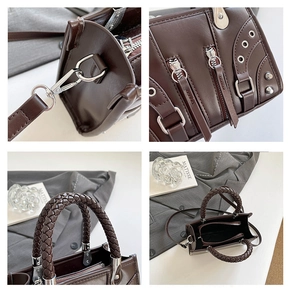 Detail of woven handle and silver rivet hardware on deep brown shoulder bag