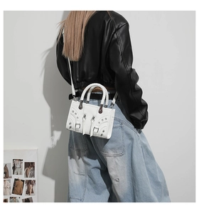 French chic biker style white leather handbag with silver studs and woven handles