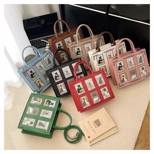 Flat lay view of multi-color cat tarot graffiti tote bags on a soft textured rug