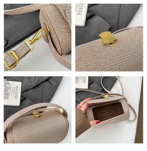 Detail showing gold box bag with wavy metallic buckle and detachable chain strap hooks