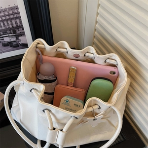 Cream drawstring bucket tote bag with large capacity for tablets and daily items