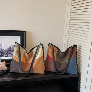 Retro color-block tote bag with minimalist geometric patchwork and slim leather straps