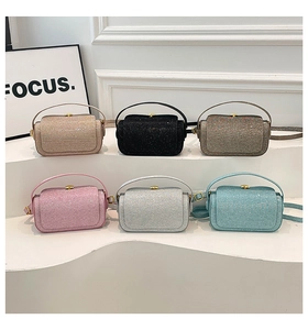 Collection of glitter sequin handbags in six colors with chain straps and wavy texture