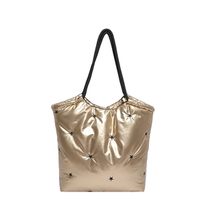 Metallic gold space cotton tote bag with black star patterns and tubular shoulder straps