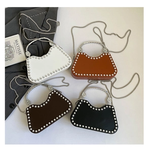 Retro box handbags with silver rivets and metal handles in four elegant vintage colors