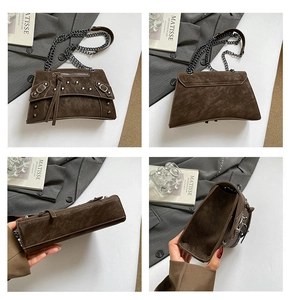 Detail view showing dark brown suede crossbody bag with metal rivets and chain strap