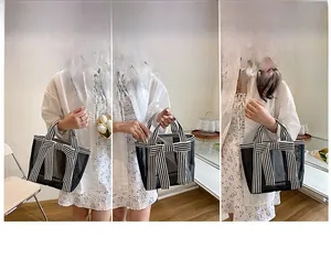 Transparent mesh tote bag with large striped bow detail and adjustable shoulder straps