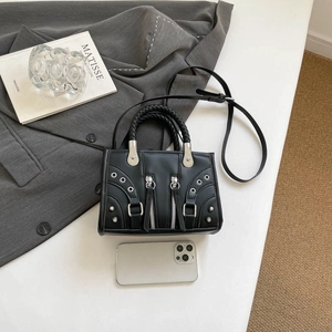 French style motorcycle handbag in black faux leather with silver studs and braided handle
