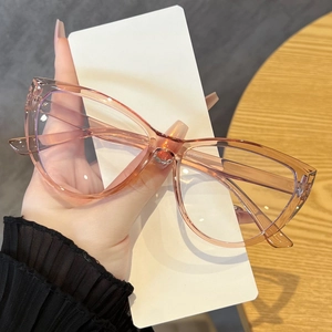 Close-up of pink cat eye glasses frames with model CY5005 engraving on the temple