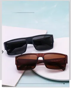 Close-up of matte blue and translucent brown polarized sunglasses with CE marks